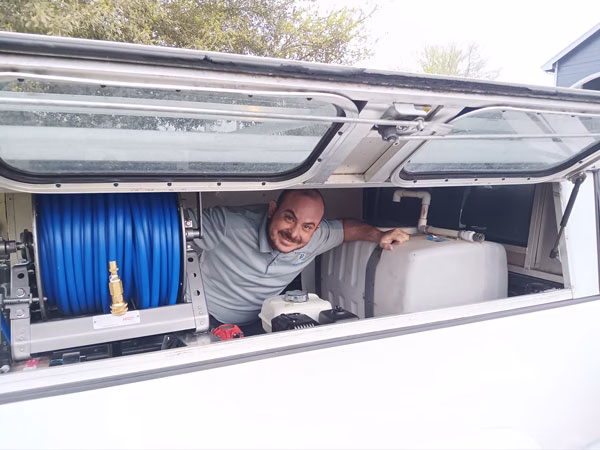 Paladin Pest Control Michael in the truck by the rig